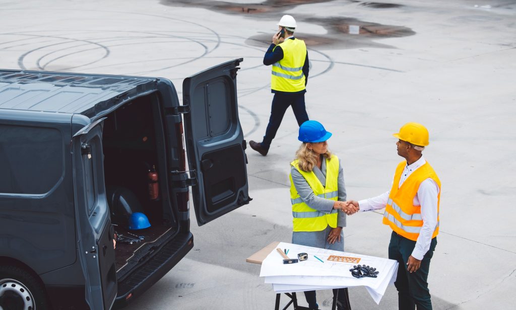 Construction industry and engineering - engineers, architects and contractors on the construction si